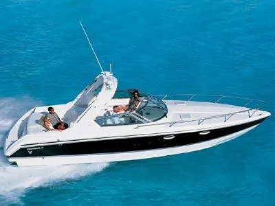 The Image of 2004 Formula 330 Sun Sport boat docked in a residential marina. - 0