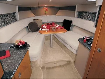 Slide: The Image of 2004 Formula 330 Sun Sport boat docked near waterfront homes. - 3