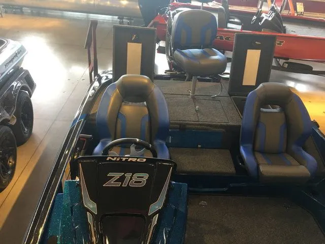 Slide: The Image of 2026 Nitro Z18 boat with blue seats and modern design. - 10