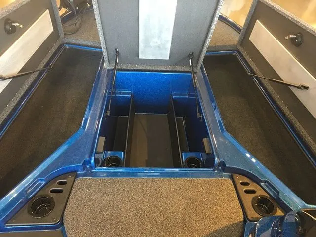 Slide: The Image of Interior of Nitro Z18 boat, 2026 model, featuring storage compartments and blue trim. - 14