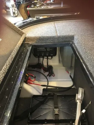 Slide: The Image of Interior of 2026 Nitro Z18 showing battery compartment and wiring. - 9