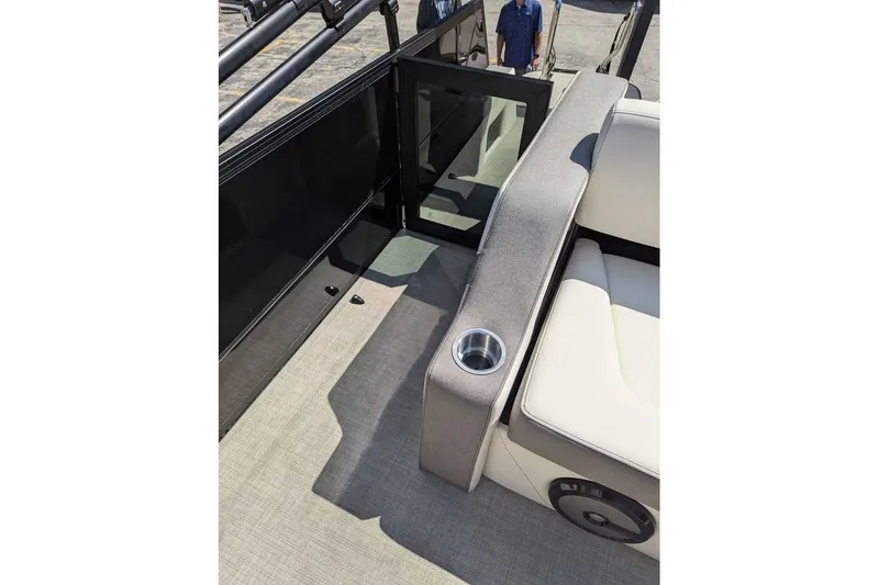 Slide: The Image of Interior of 2026 Alera M23L boat with seating and cup holder. - 10