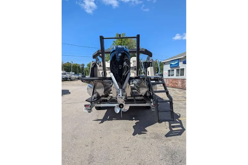 Slide: The Image of 2026 Alera M23L boat with powerful outboard motor, parked on a sunny day. - 3