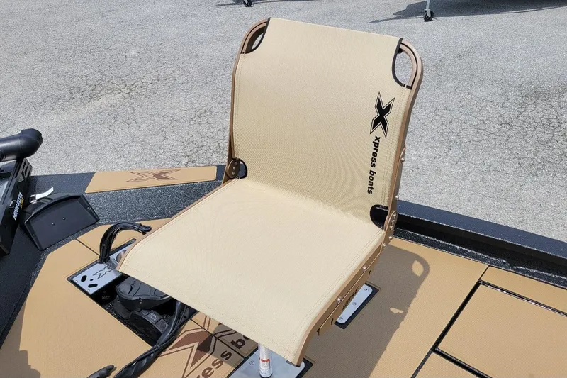 Slide: The Image of 2026 Xpress H20C Crappie boat seat with logo, featuring a beige design. - 9