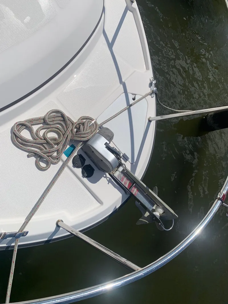 Slide: The Image of 2020 Ranger Tugs R-25 boat bow with anchor and coiled rope. - 13