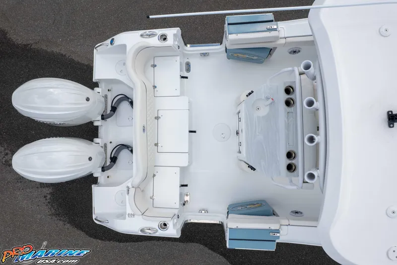 Slide: The Image of Top view of 2026 Sea Hunt Ultra 265 SE boat with dual engines and spacious deck. - 35