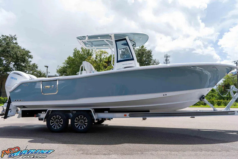 Slide: The Image of 2026 Sea Hunt Ultra 265 SE boat on trailer, side view, outdoors. - 46
