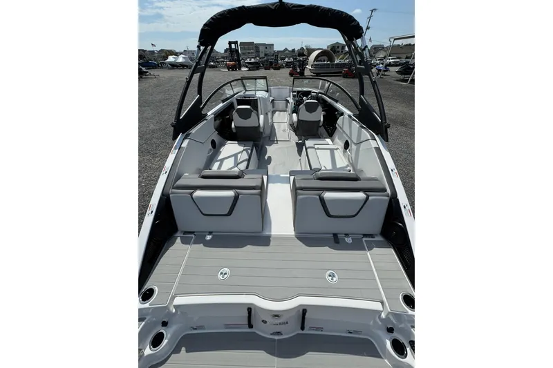 Slide: The Image of 2026 Yamaha Boats AR250 interior with seating and sleek design. - 10