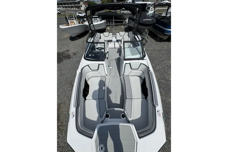 Slide: The Image of 2026 Yamaha Boats AR250 with sleek interior design and spacious seating. - 11