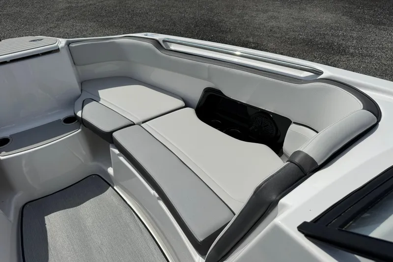 Slide: The Image of 2026 Yamaha Boats AR250 interior seating with sleek, modern design and comfortable upholstery. - 14