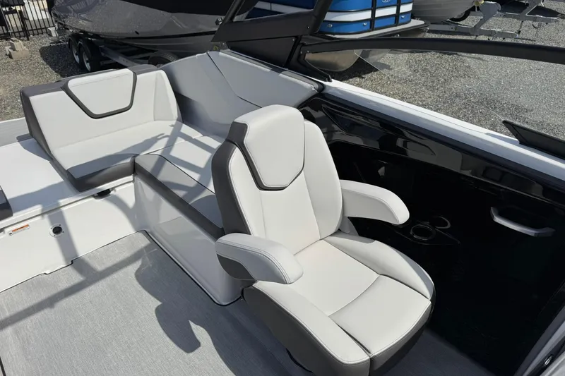 Slide: The Image of 2026 Yamaha Boats AR250 interior with modern seating and sleek design. - 8