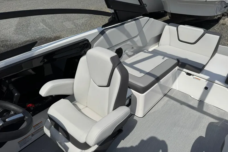 Slide: The Image of 2026 Yamaha Boats AR250 interior with modern seating and sleek design. - 9