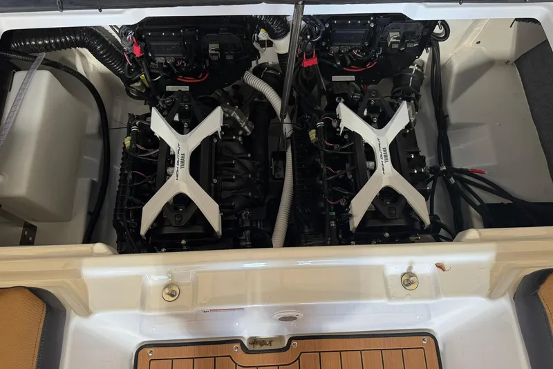 Slide: The Image of 2026 Yamaha Boats 252SD engine compartment with dual engines and wiring. - 7
