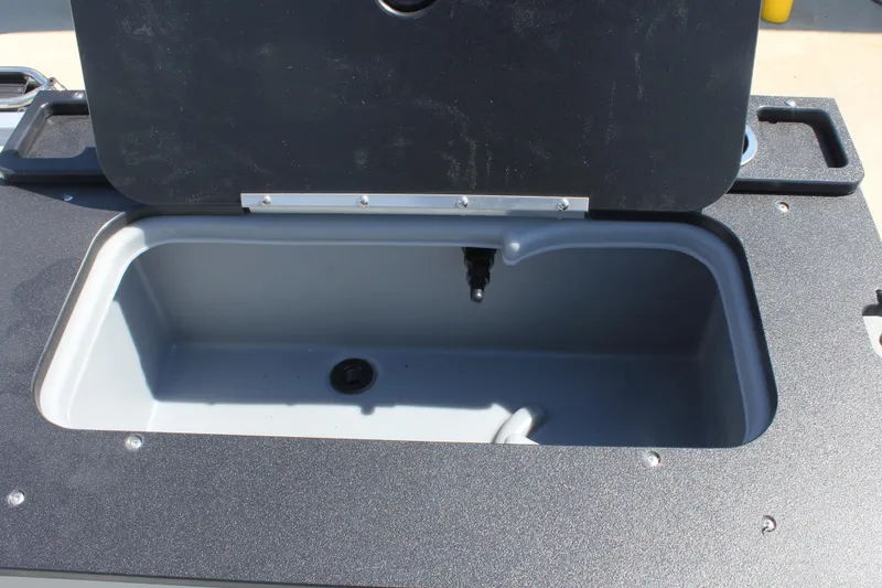 Slide: The Image of Livewell compartment on 2026 Sun Tracker Fishin' Barge 20 DLX pontoon boat. - 21