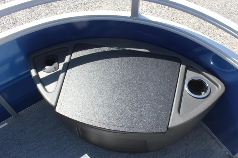 Slide: The Image of 2026 Sun Tracker Fishin' Barge 20 DLX deck with cup holders and storage. - 8