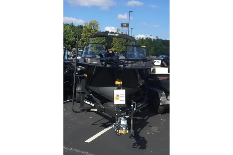 The Image of 2026 Tracker Targa V-19 Combo boat on trailer in parking lot. - 0