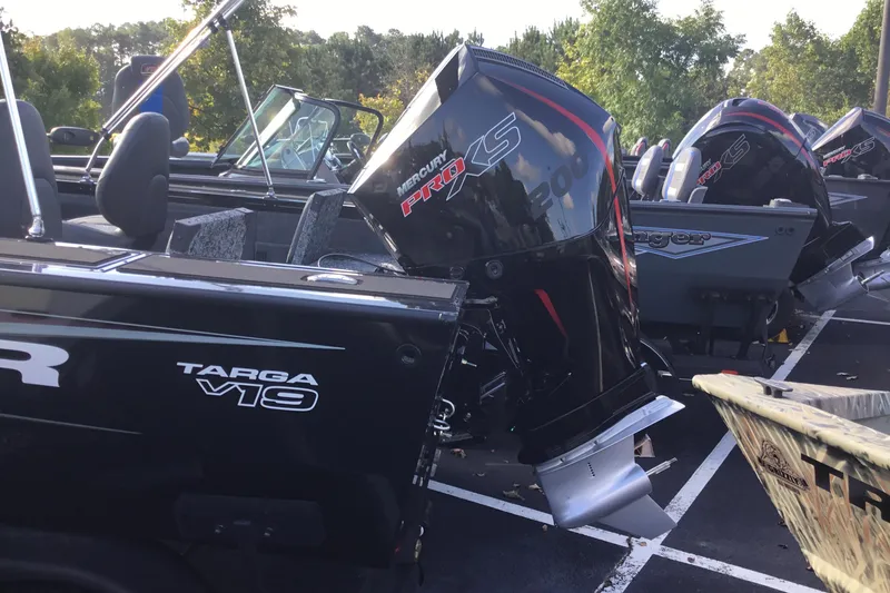 Slide: The Image of 2026 Tracker Targa V-19 Combo boat interior with foot pedal and wiring details. - 10