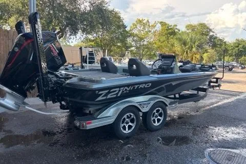 The Image of 2024 Nitro Z21 XL boat with dual seats and powerful engine, parked outdoors. - 0