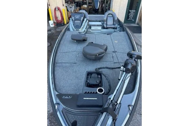 Slide: The Image of 2024 Nitro Z21 XL fishing boat with spacious deck and advanced equipment. - 2