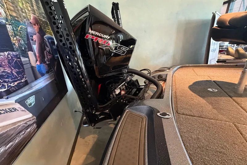 Slide: The Image of 2024 Nitro Z21 XL boat with Mercury Pro XS engine in showroom display. - 4