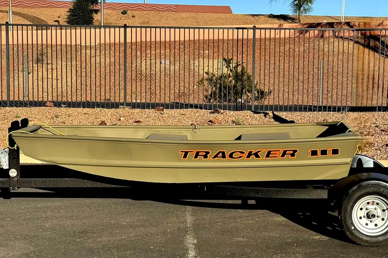 The Image of 2026 Tracker Grizzly 10 Jon boat on trailer, parked outdoors. - 0