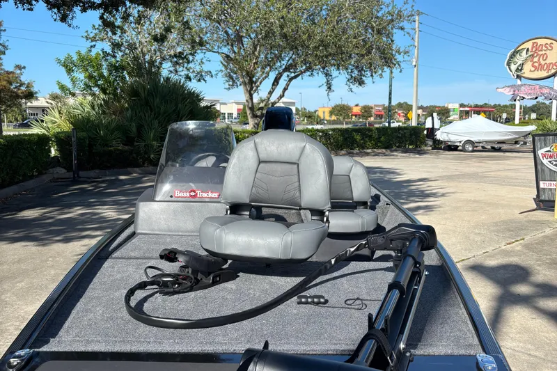 Slide: The Image of 2026 Tracker Bass Tracker Classic XL boat with gray seats at Bass Pro Shops. - 2