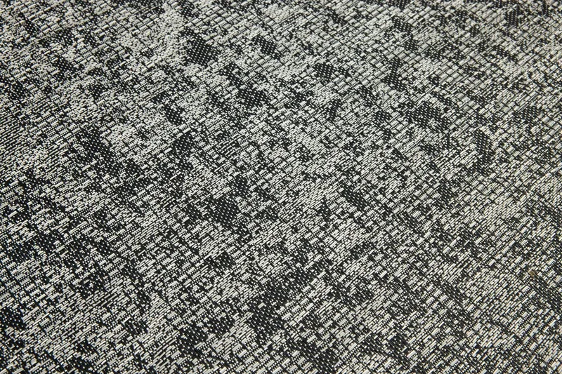Slide: The Image of Close-up of a textured, woven pattern in black and white. - 29