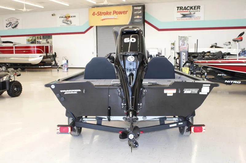 Slide: The Image of 2026 Tracker Pro Team 175 boat with Mercury 60 engine in showroom. - 4