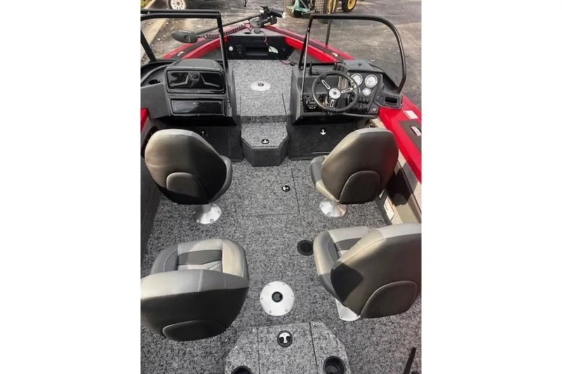 Slide: The Image of 2026 Tracker Targa V-18 WT boat interior with four seats and steering console. - 85