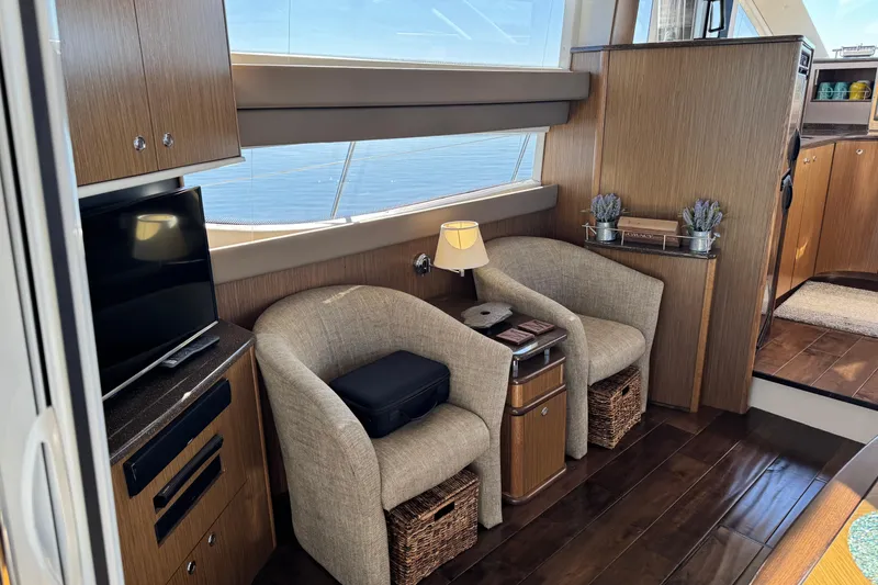 Slide: The Image of Luxurious interior of 2016 Meridian 441 yacht with cozy seating and modern amenities. - 26