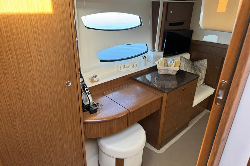 Slide: The Image of Luxurious interior of 2016 Meridian 441 yacht with elegant wood finish and modern amenities. - 55