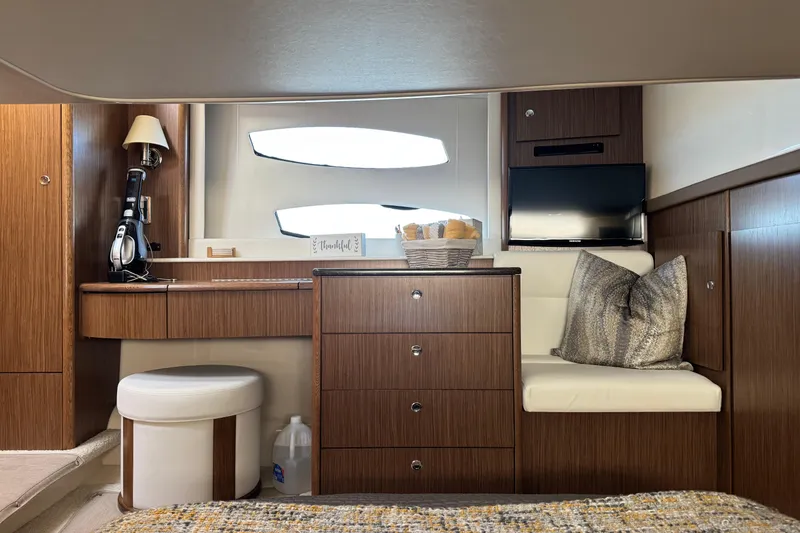 Slide: The Image of Luxurious interior of a 2016 Meridian 441 yacht with elegant wood finishes and modern amenities. - 59