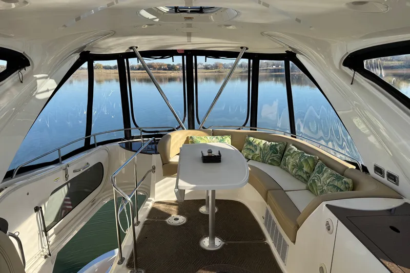Slide: The Image of Luxurious interior of 2016 Meridian 441 yacht with panoramic windows and elegant seating. - 72