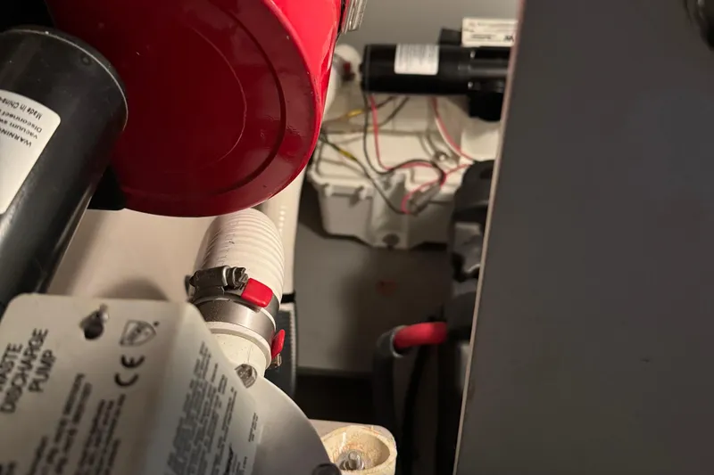 Slide: The Image of Engine compartment of a 2016 Meridian 441 with visible wiring and components. - 87