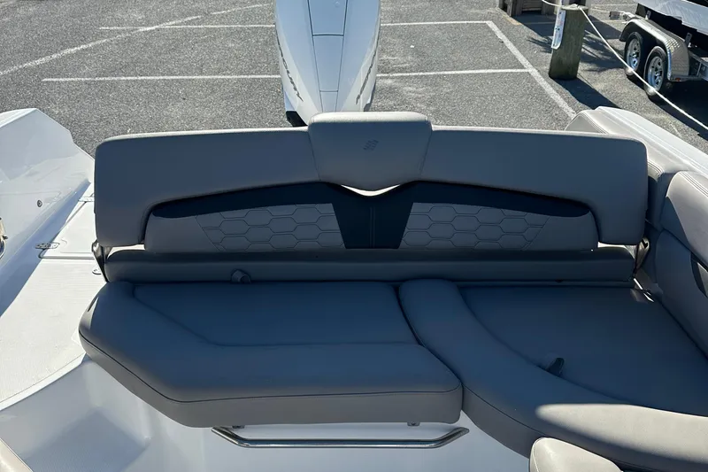 Slide: The Image of 2022 Four Winns HD5 OB boat with gray seating and modern design. - 20