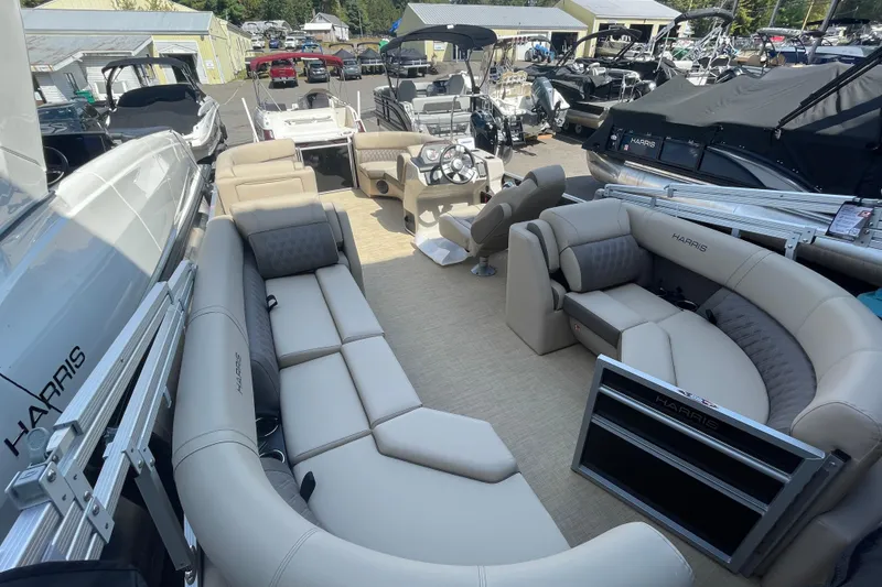 Slide: The Image of 2026 Harris Cruiser 210 CW pontoon boat with spacious seating and modern design. - 4