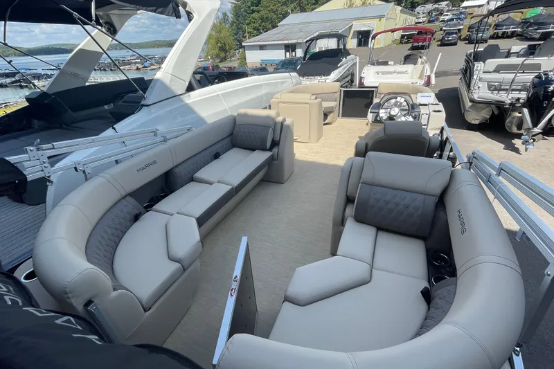 Slide: The Image of 2026 Harris Cruiser 210 CW pontoon boat with luxurious seating and modern design. - 5