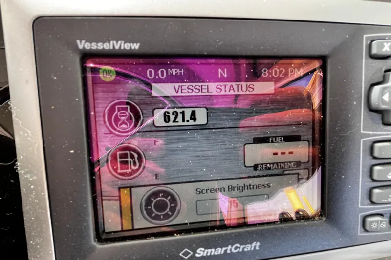 Slide: The Image of VesselView display on 2009 Tiara Yachts 3900 Open showing vessel status and fuel level. - 17