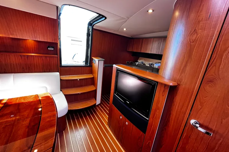 Slide: The Image of Luxurious 2009 Tiara Yachts 3900 Open interior with wood finish and modern amenities. - 26