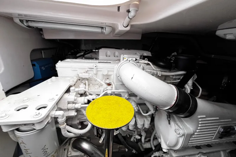 Slide: The Image of Engine compartment of a 2009 Tiara Yachts 3900 Open, showcasing mechanical components. - 29
