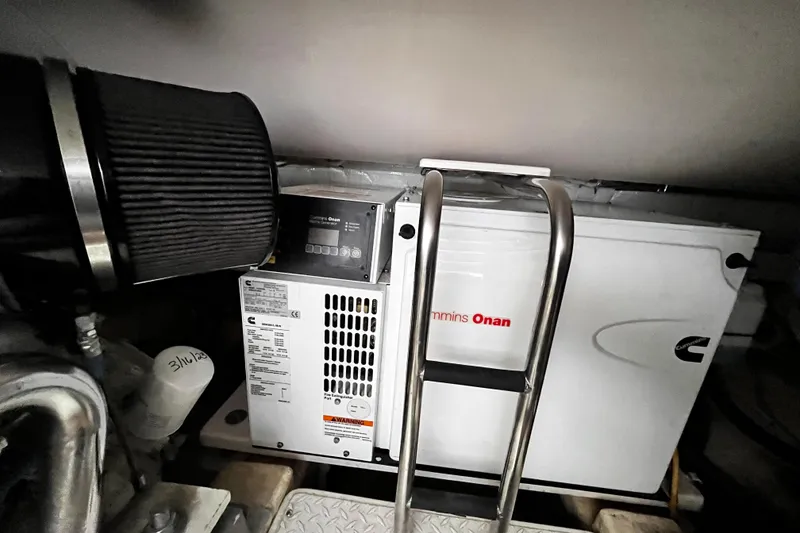 Slide: The Image of Engine room of 2009 Tiara Yachts 3900 Open with Cummins Onan generator. - 31