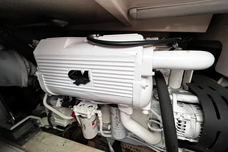 Slide: The Image of Engine compartment of a 2009 Tiara Yachts 3900 Open, showcasing mechanical components. - 34