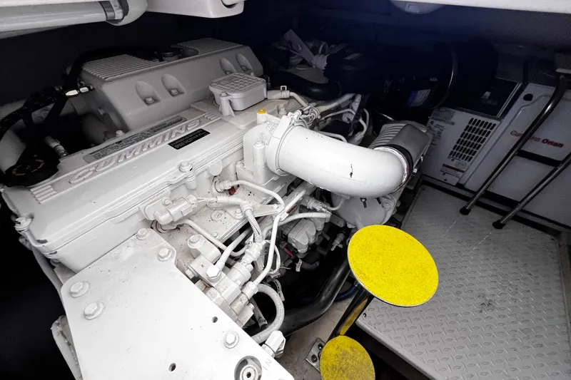 Slide: The Image of Engine room of 2009 Tiara Yachts 3900 Open, featuring Cummins engine components. - 35