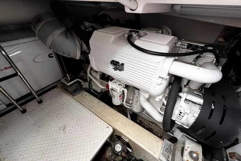 Slide: The Image of Engine room of a 2009 Tiara Yachts 3900 Open, showcasing mechanical components. - 36