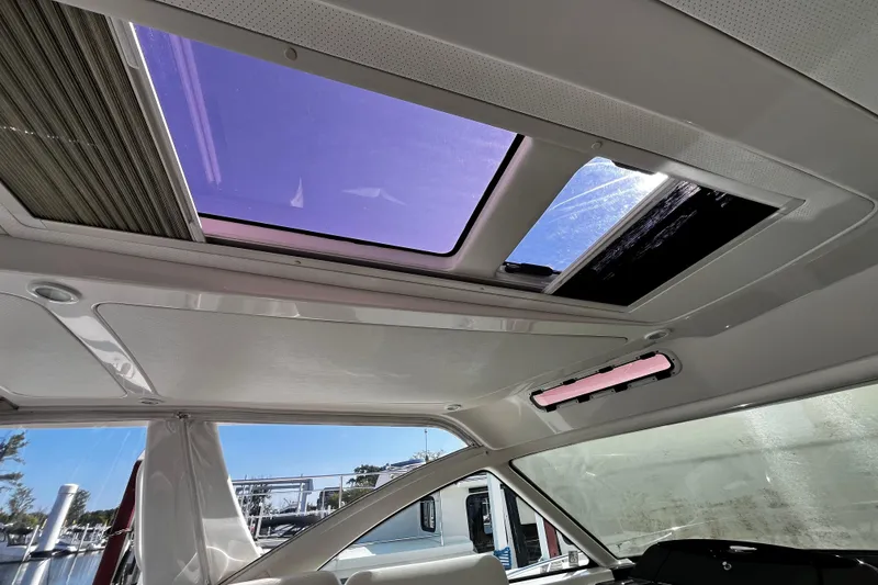 Slide: The Image of 2009 Tiara Yachts 3900 Open interior with sunroof and sleek design. - 39