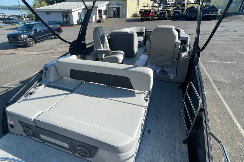 Slide: The Image of 2026 Harris Solstice 230SLDH pontoon boat interior with plush seating and modern design. - 8
