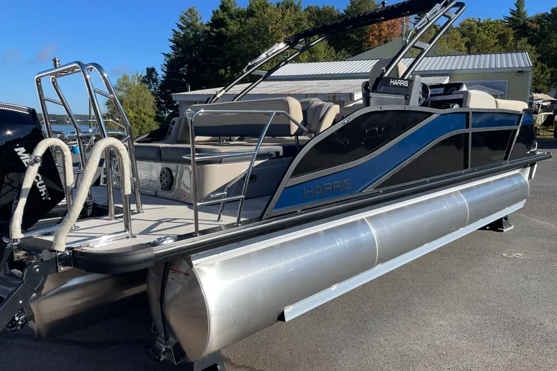 Slide: The Image of 2026 Harris Grand Mariner 230 SL pontoon boat with sleek design and modern features. - 11