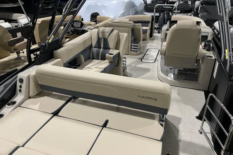 Slide: The Image of 2026 Harris Grand Mariner 230 SL pontoon boat interior with luxurious seating and modern design. - 14