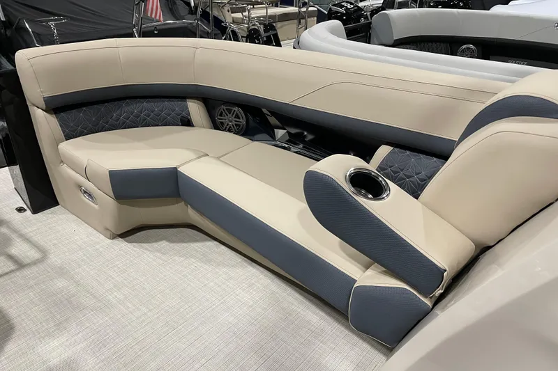 Slide: The Image of Luxurious seating on 2026 Harris Grand Mariner 230 SL pontoon boat, featuring elegant upholstery and cup holder. - 18