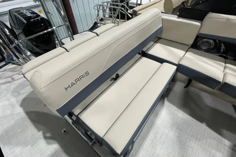 Slide: The Image of 2026 Harris Grand Mariner 230 SL boat seating with beige upholstery and sleek design. - 21